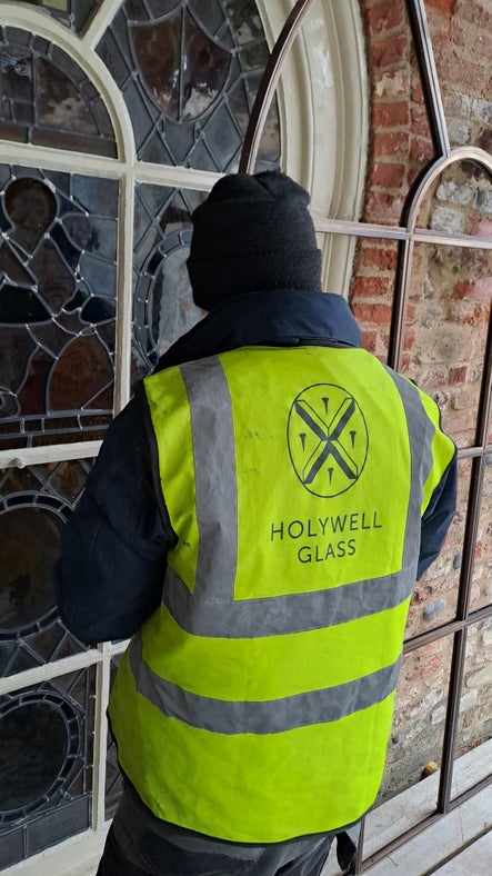 Installing the Environmental Protective Glazing at Elizabethan House